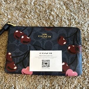 Coach cherry print wristlet